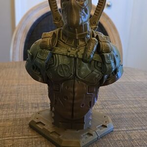 Green and Brown Decorative Bust Deadpool